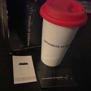 Université of Omega Travel Mug with Red Lid